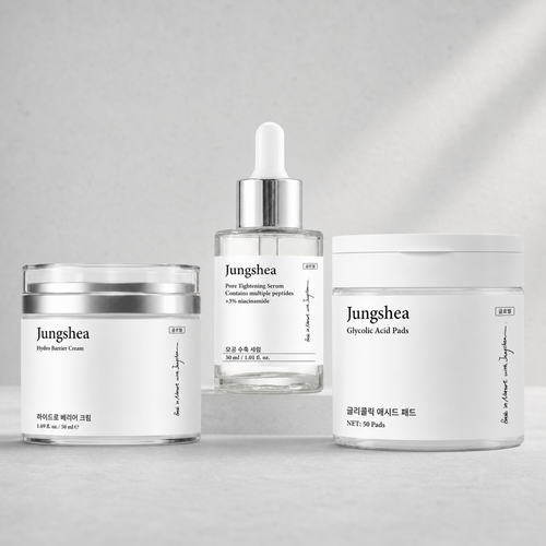 Jungshea serum, barrier cream, and glycolic acid pads arranged together on a light gray background