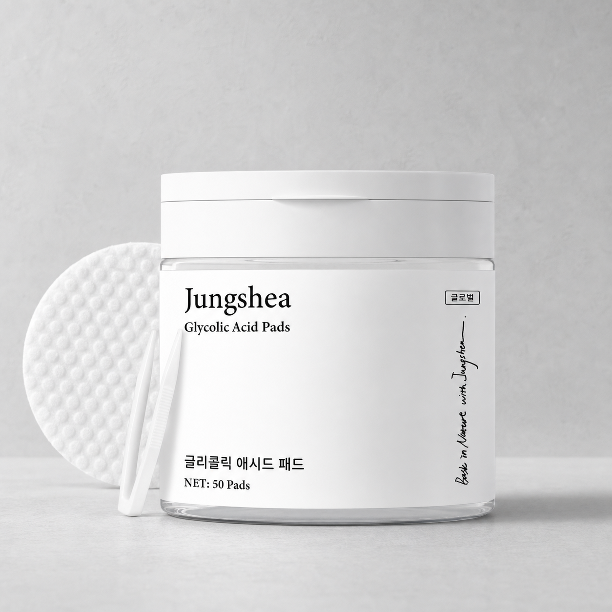 Jungshea Resurfacing Glycolic Acid Exfoliating Pads jar with a textured pad and tweezers