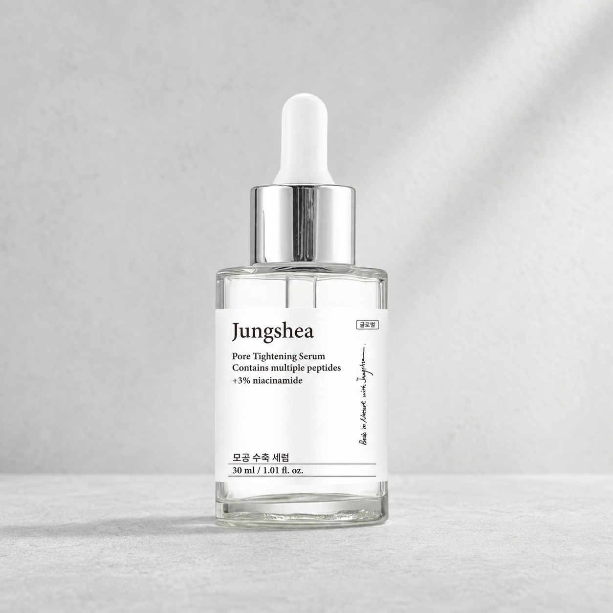 Jungshea Pore Minimizing Niacinamide 3% Serum dropper bottle on a light gray background